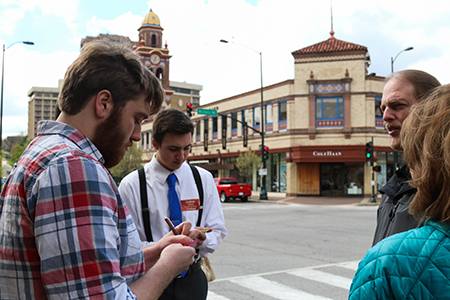 #OneDayKC participants speak with members of the public to gather feedback on their ideas. Photo by Chandler Eaton.
